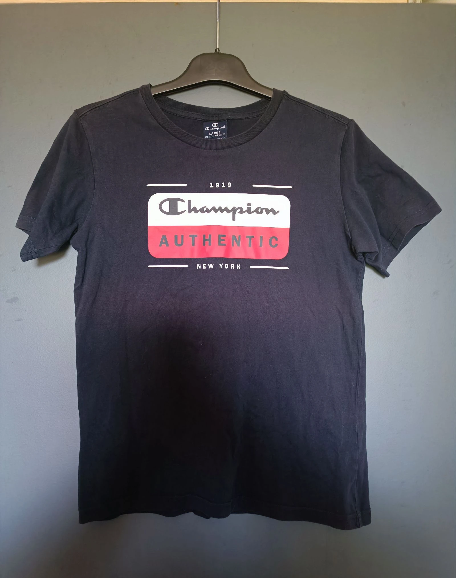 Tee-shirt garçon Champion taille 11/12 ans très bon état coloris bleu marine 